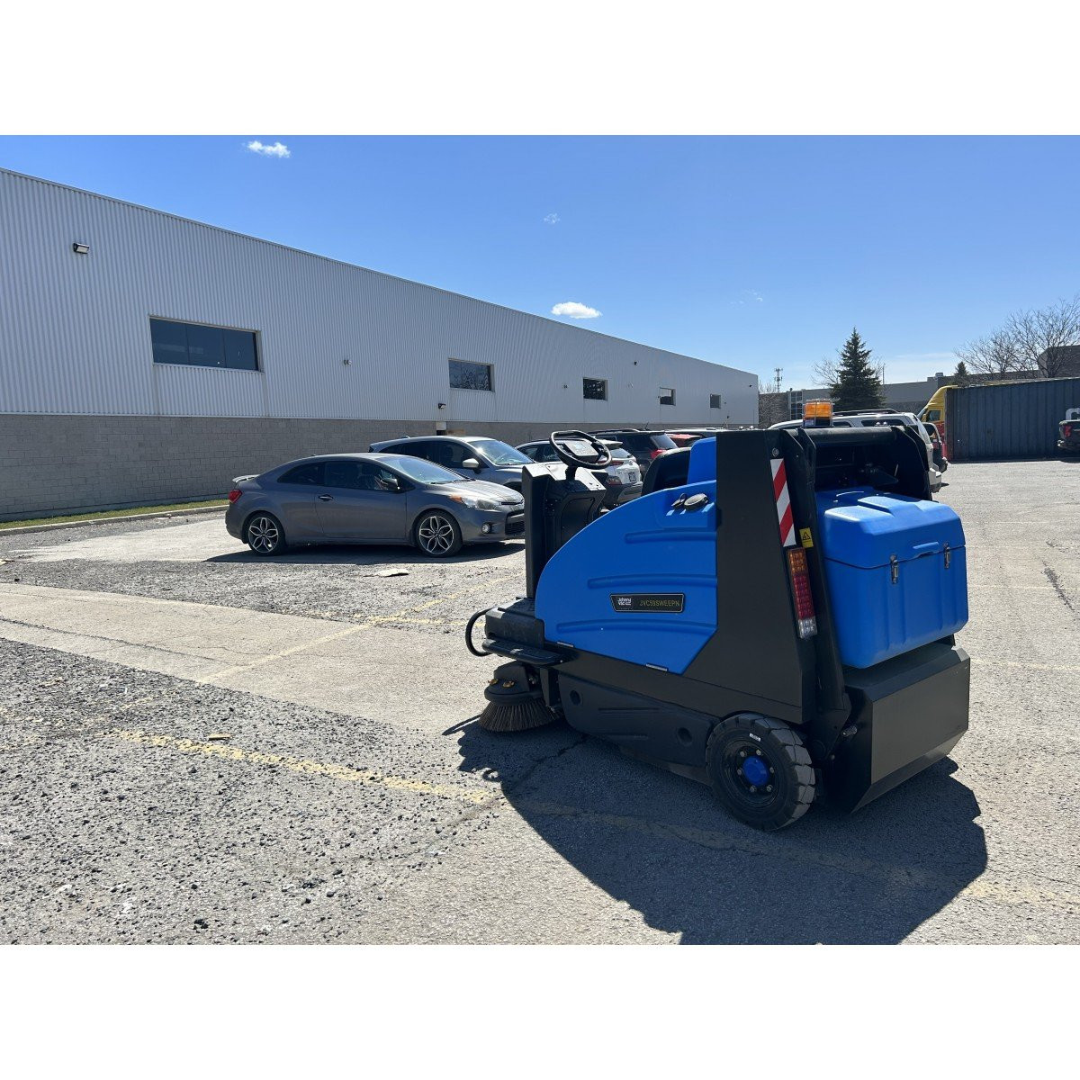 Industrial Ride-On Sweeper Machine JVC59SWEEPN from Johnny Vac - 59" (1498 mm) Cleaning Path - Battery & Charger Included